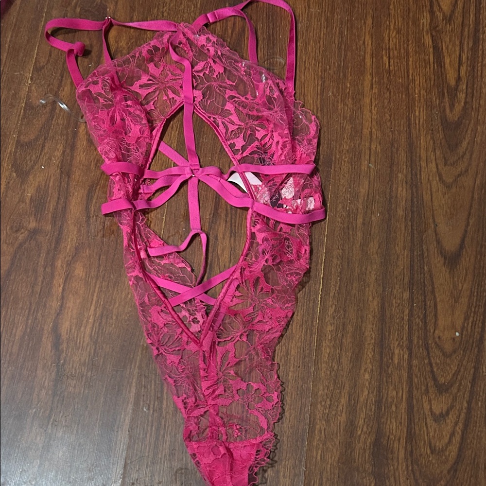 Pink lace teddy.